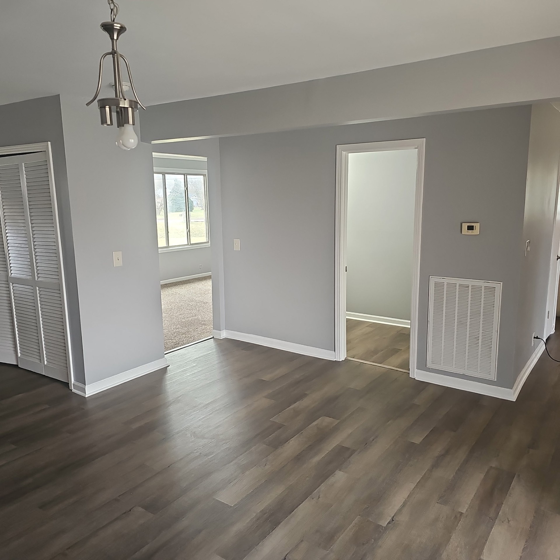 4100 Cato Road Nashville, TN 37218 - Photo 4 of 17 a view of empty room with wooden floor and fan
