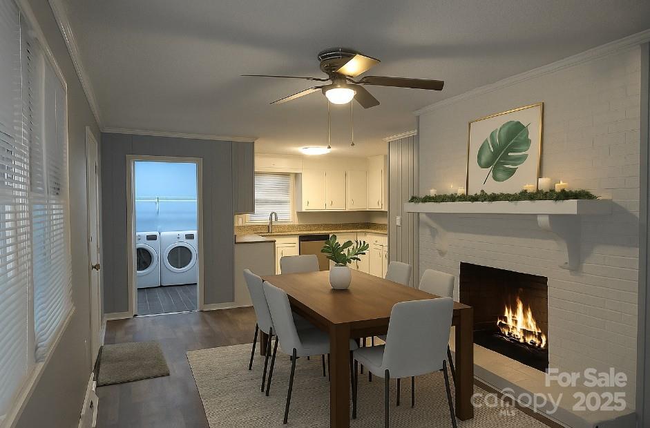 1660 Songwood Road Concord, NC 28025 - Photo 12 of 32 a dining room with furniture and a fireplace