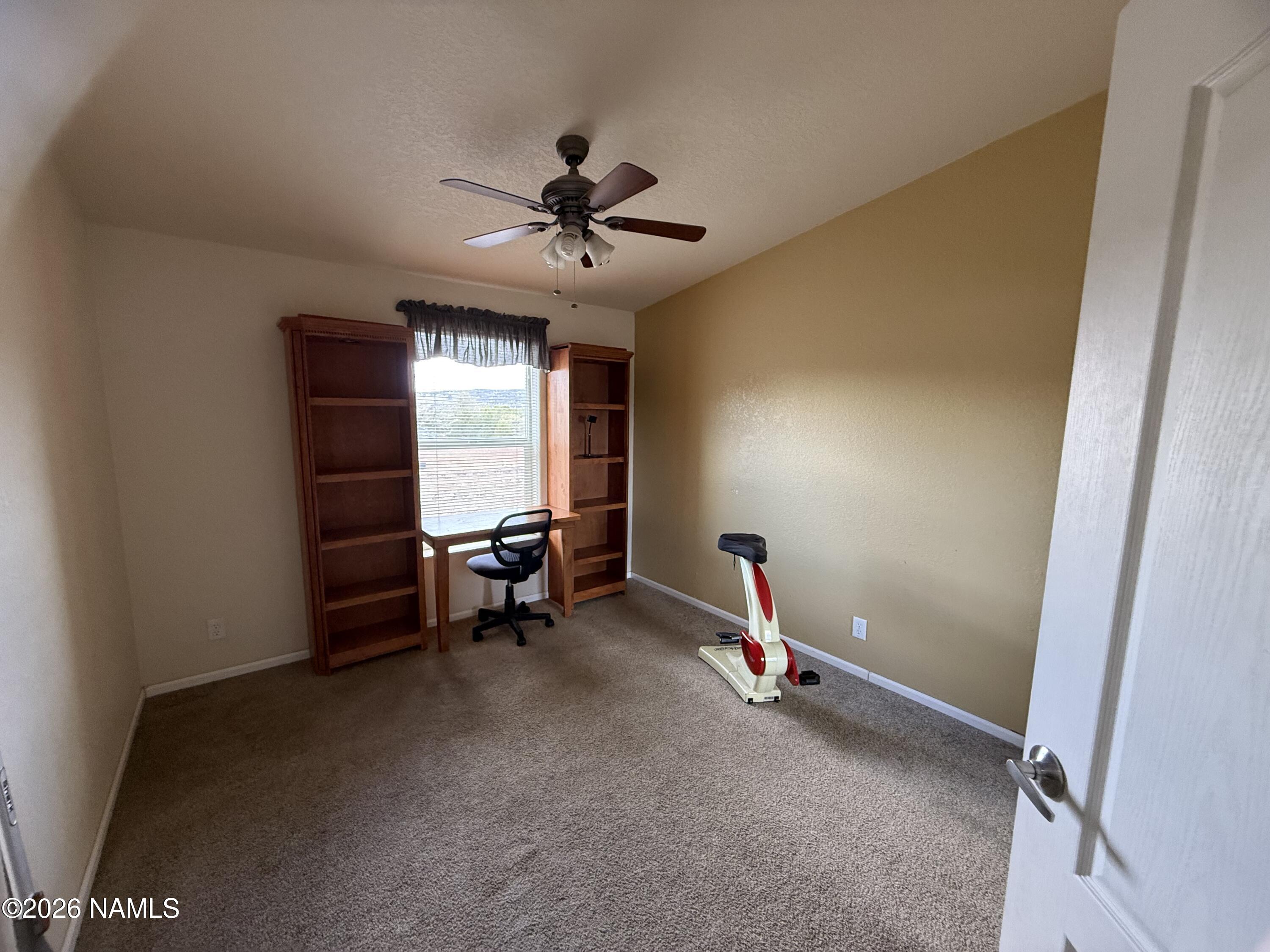 1431 East Cedar Road Williams, AZ 86046 - Photo 24 of 51 a view of a livingroom with furniture and a window