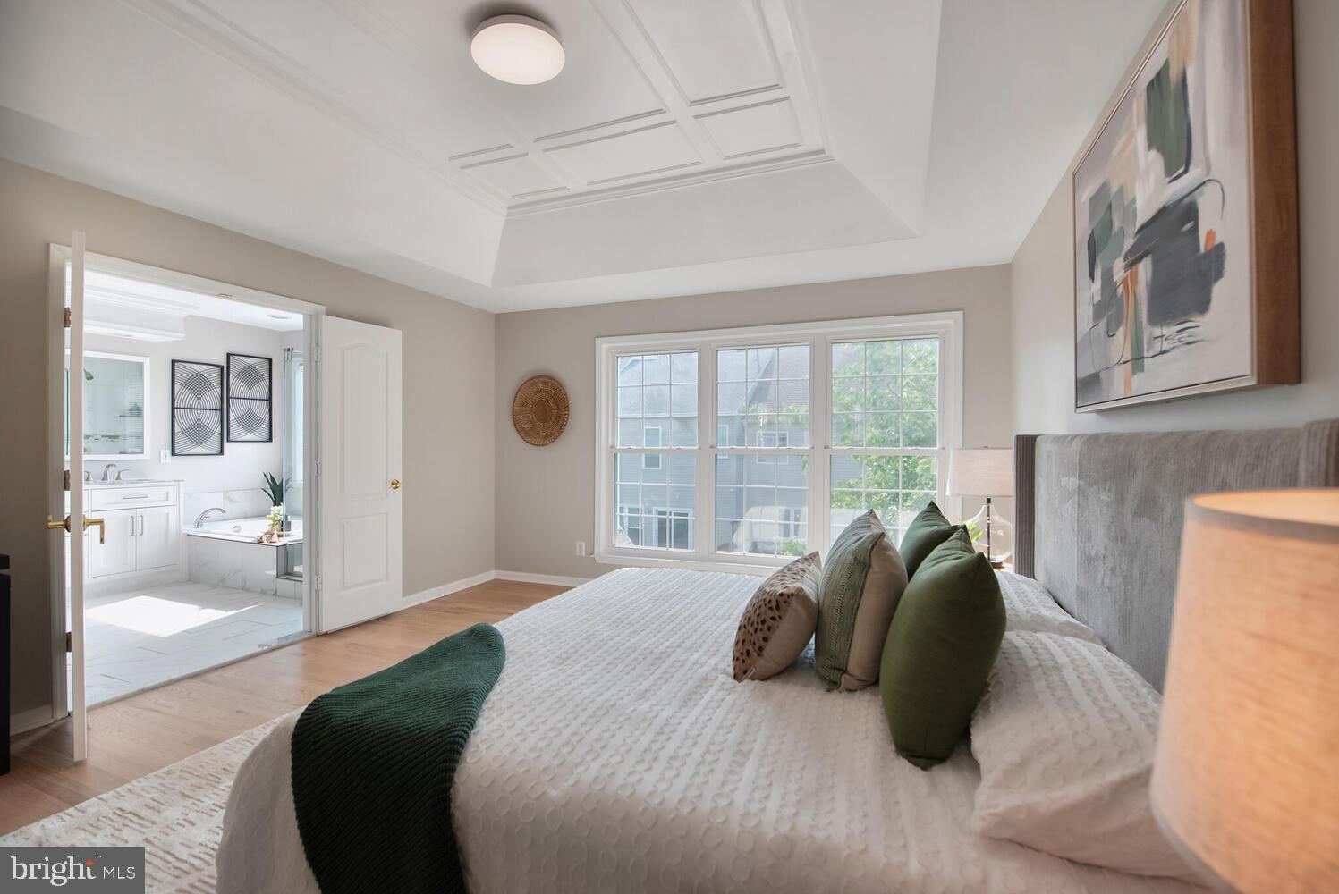 20881 Trinity Square Sterling, VA 20165 - Photo 13 of 35 a bedroom with a large bed and a large window