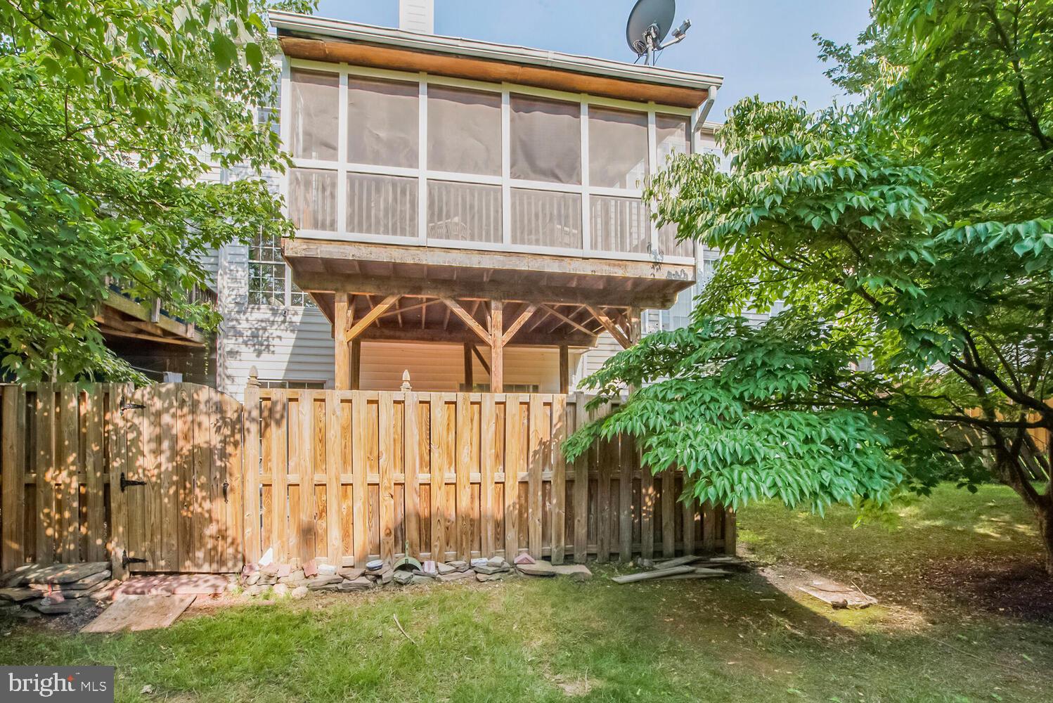 20881 Trinity Square Sterling, VA 20165 - Photo 24 of 35 front view of a house with a yard