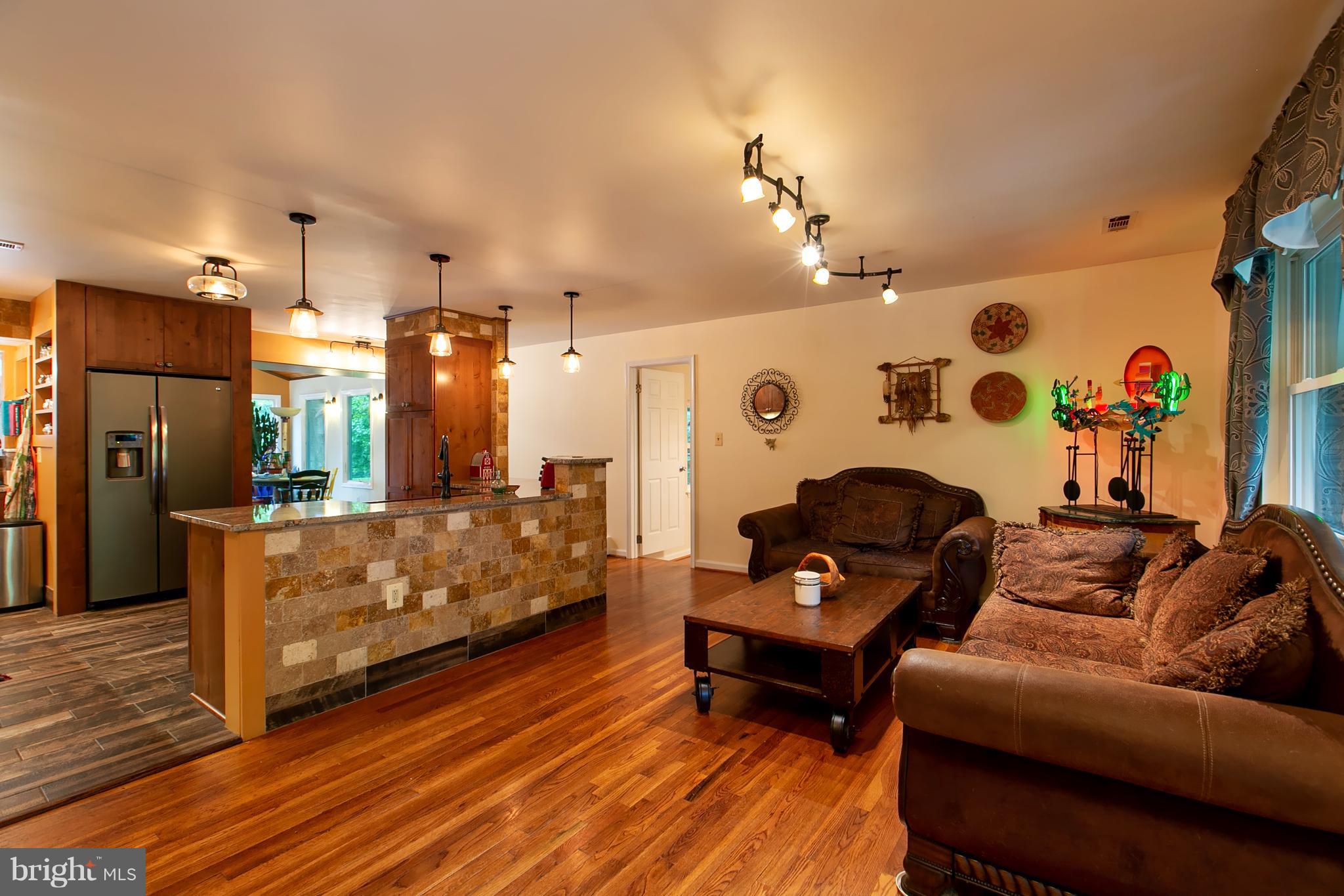 13015 Bottom Road Hydes, MD 21082 - Photo 3 of 30 a living room with furniture and wooden floor