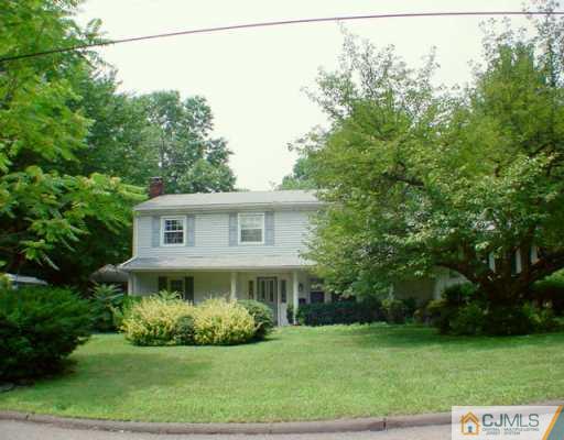 178 Colonia Road Colonia, NJ 07067 - Photo 1 of 2 a front view of a house with a yard