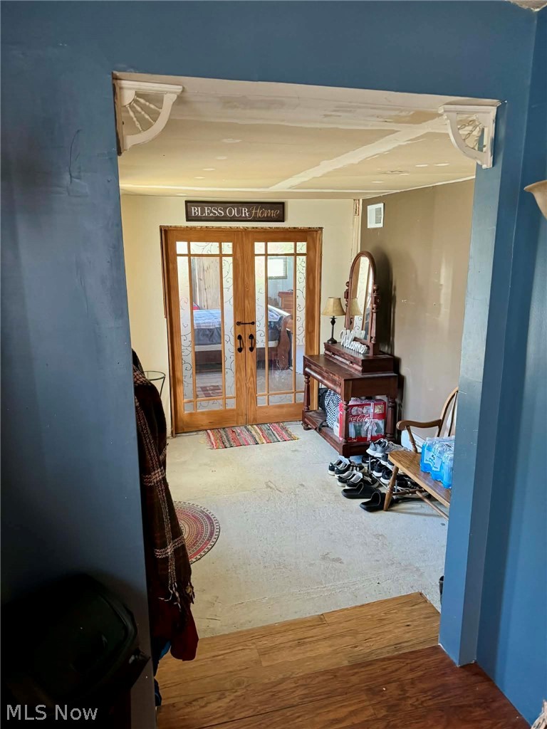 6205 Jefferson Road Ashtabula, OH 44004 - Photo 8 of 20 Dining Rm looking through breezeway, Family Rm French Doors