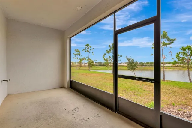 a view of a hallway with white walls