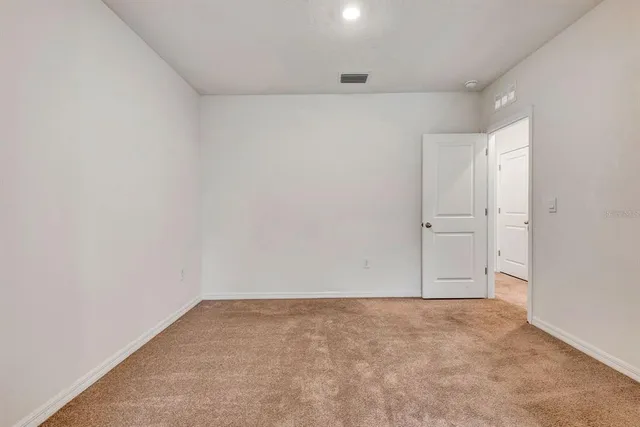 an empty room with an entryway