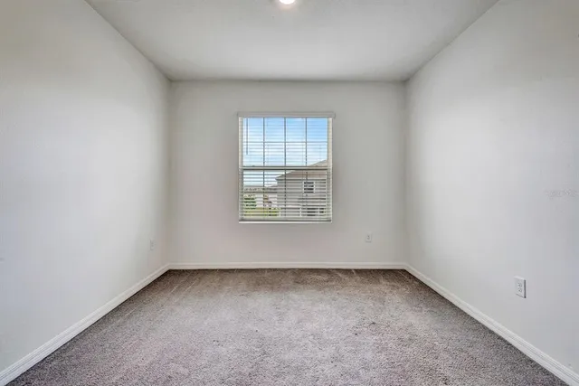a wooden bench sitting in a room