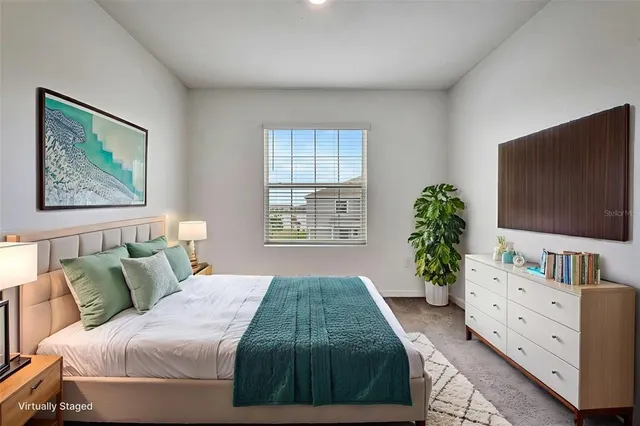a view of room with wooden floor