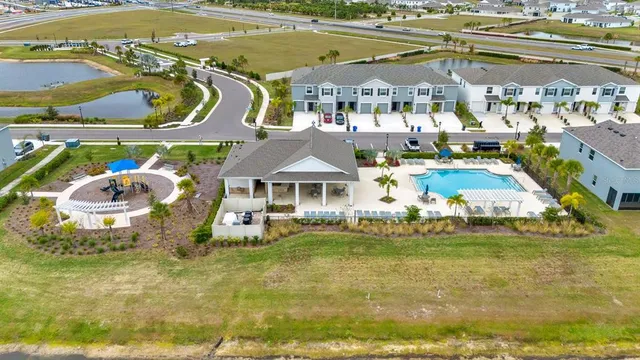 a view of a lake with a building in the background