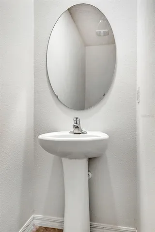 an empty room with sliding glass door