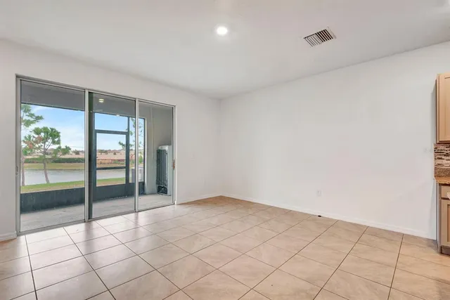 a hallway with a sink and a window