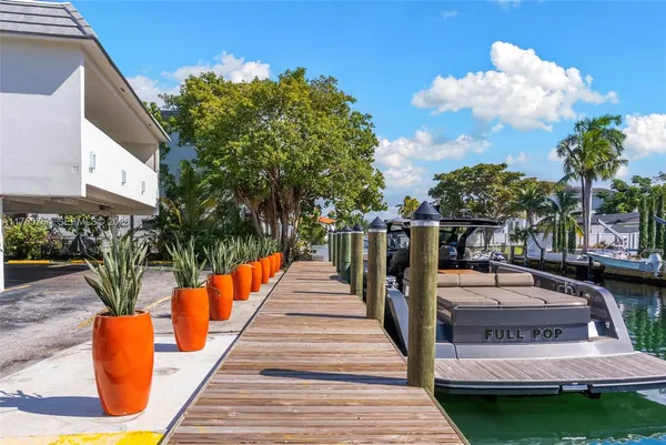 a view of a city with lawn chairs