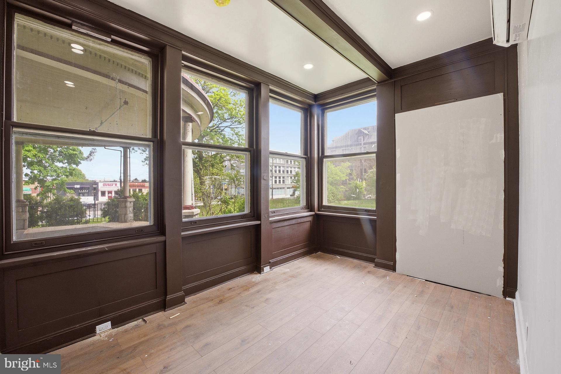6012 Ridge Avenue, Unit 2 Philadelphia, PA 19128 - Photo 7 of 15 a view of an empty room with a window