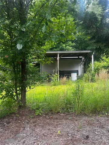 a view of outdoor space and yard