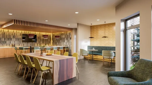 a dining room with furniture and a floor to ceiling window