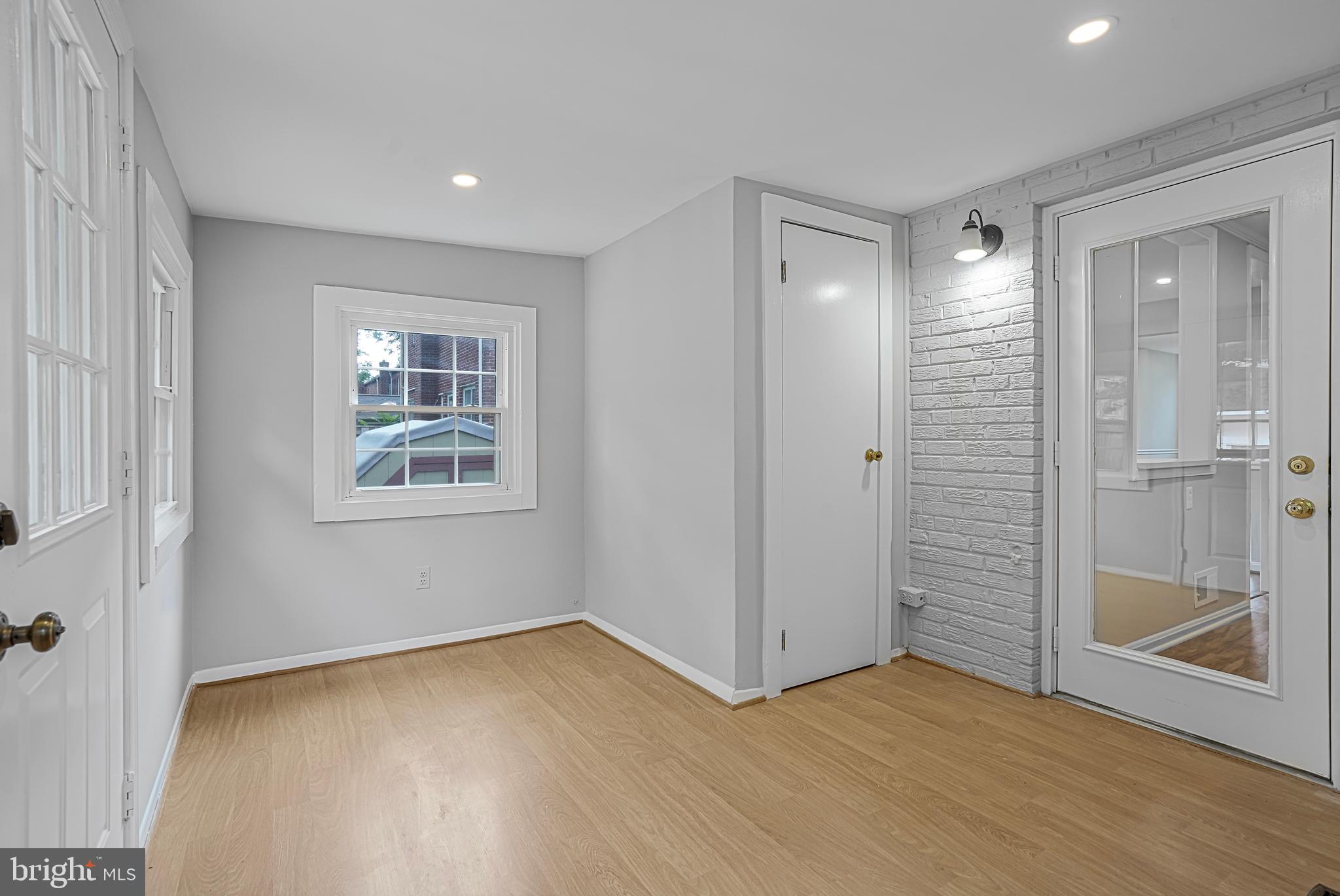 3202 13th Road South Arlington, VA 22204 - Photo 13 of 32 wooden floor in an empty room with a window