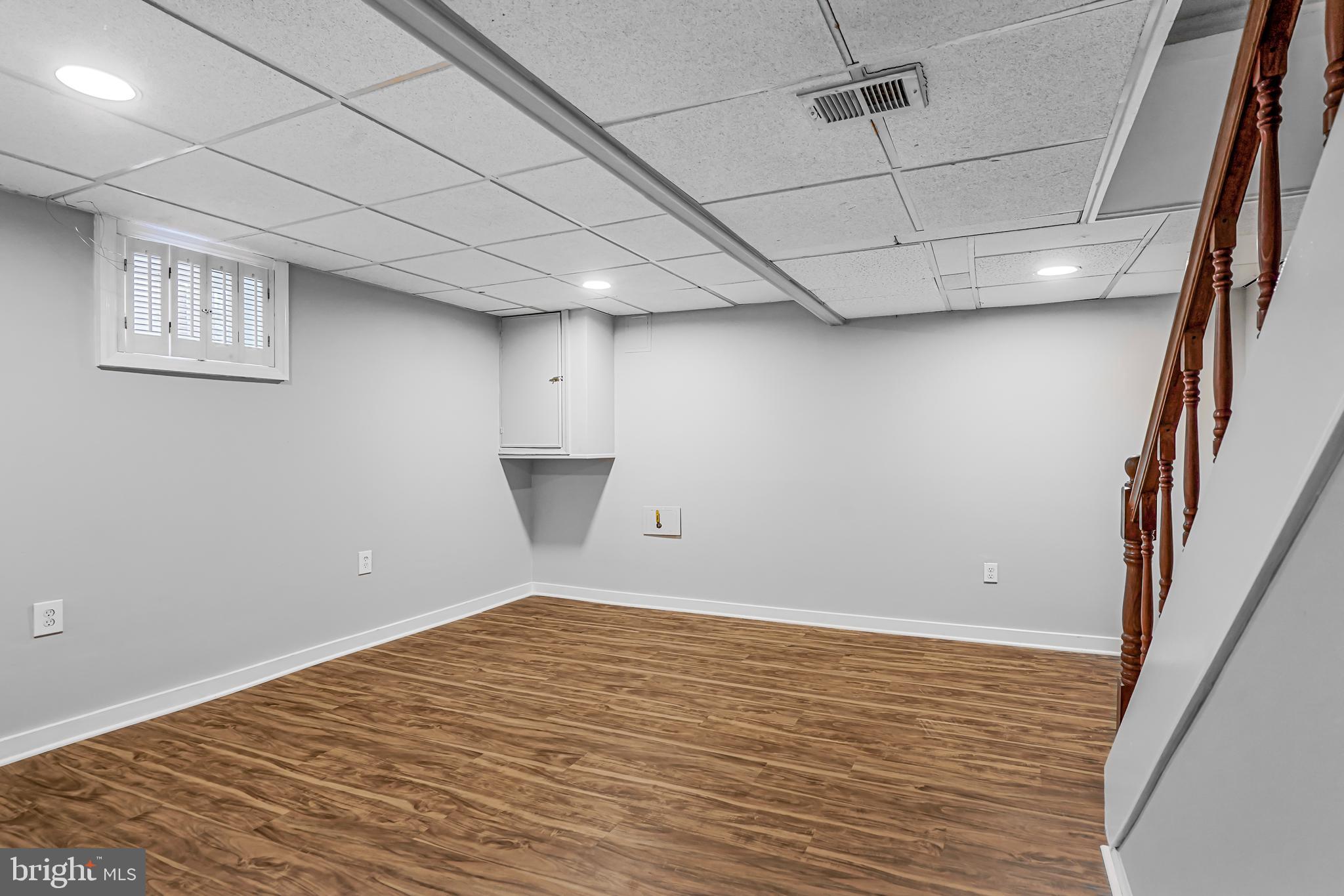 3202 13th Road South Arlington, VA 22204 - Photo 23 of 32 a view of empty room with wooden floor and fan
