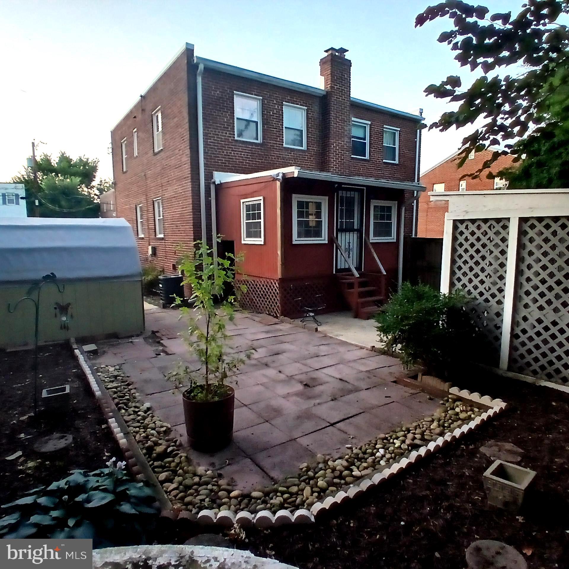 3202 13th Road South Arlington, VA 22204 - Photo 29 of 32 a front view of a house with a yard