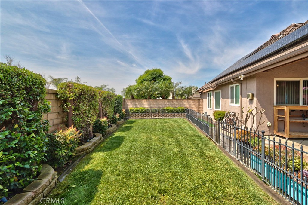 1986 White Rabbit Trail Upland, CA 91784 - Photo 34 of 50 Rear yard- side yard/sod