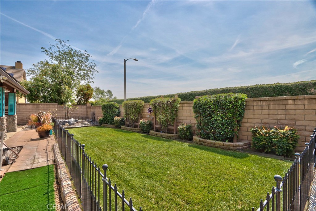 1986 White Rabbit Trail Upland, CA 91784 - Photo 36 of 50 Rear yard- side yard/sod