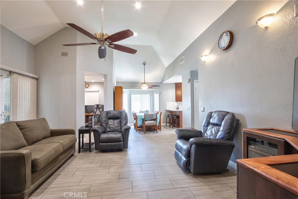1986 White Rabbit Trail Upland, CA 91784 - Photo 6 of 50 Living room leading to bonus 4th room, dining room and kitchen.
