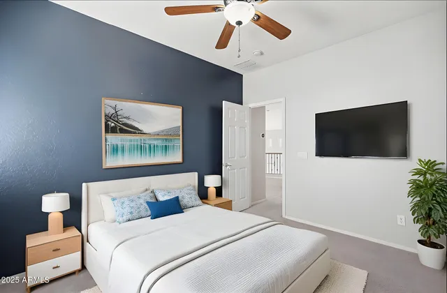 a view of house with backyard and sitting area