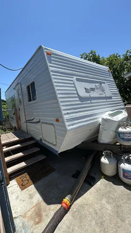 a view of a balcony with an outdoor space