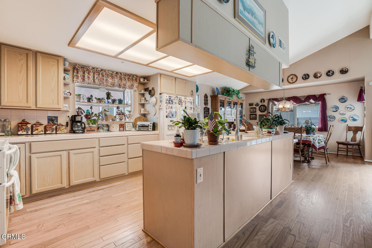 840 Mandalay Beach Road Oxnard, CA 93035 - Photo 12 of 39 a kitchen filled with white cabinets and white appliances
