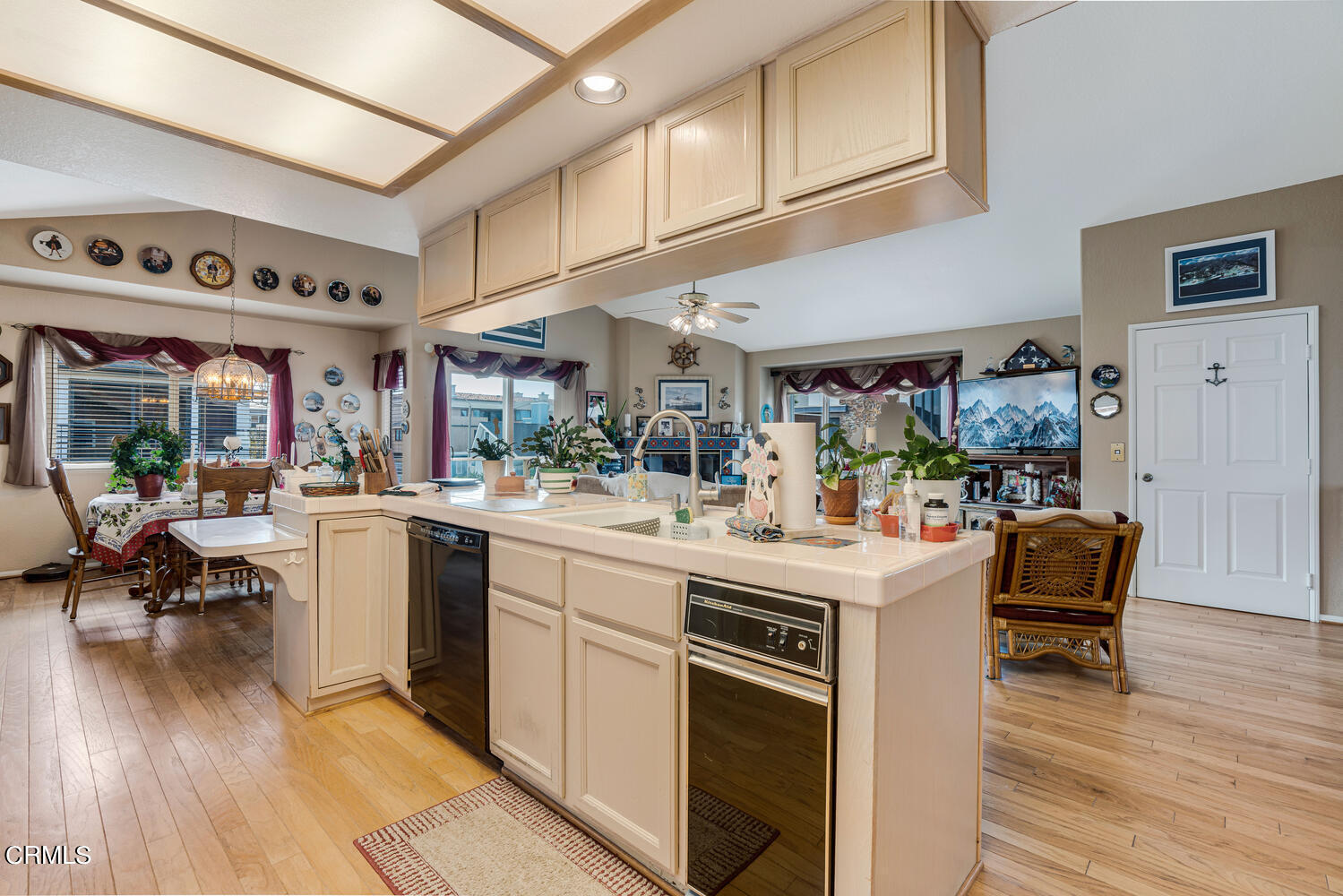 840 Mandalay Beach Road Oxnard, CA 93035 - Photo 13 of 39 a view of kitchen with furniture and wooden floor