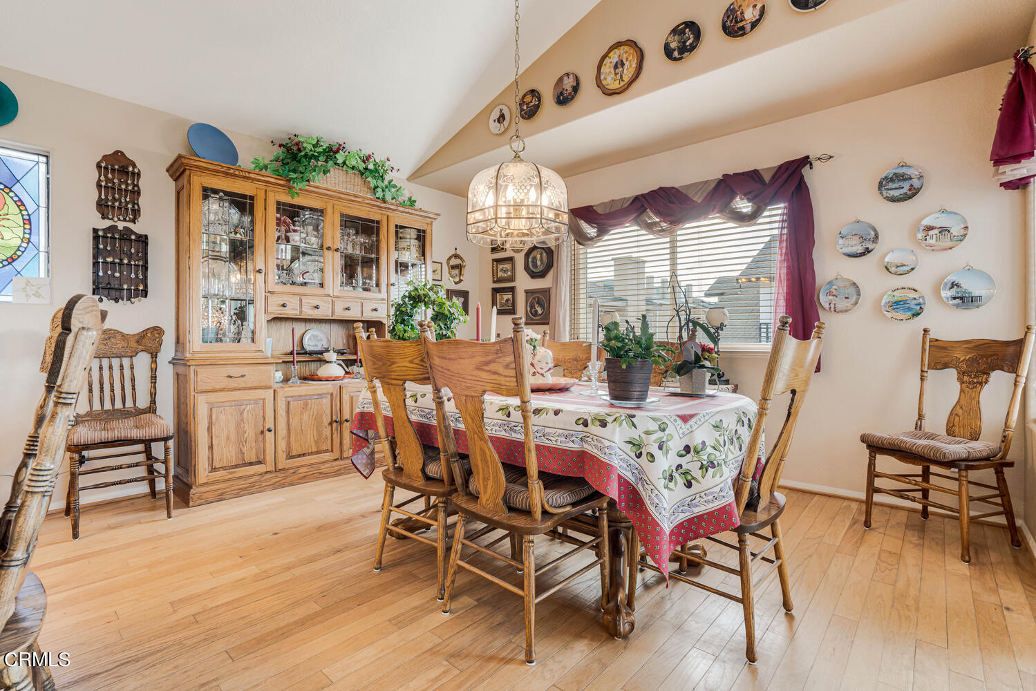 840 Mandalay Beach Road Oxnard, CA 93035 - Photo 17 of 39 a view of a dining room with furniture and wooden floor