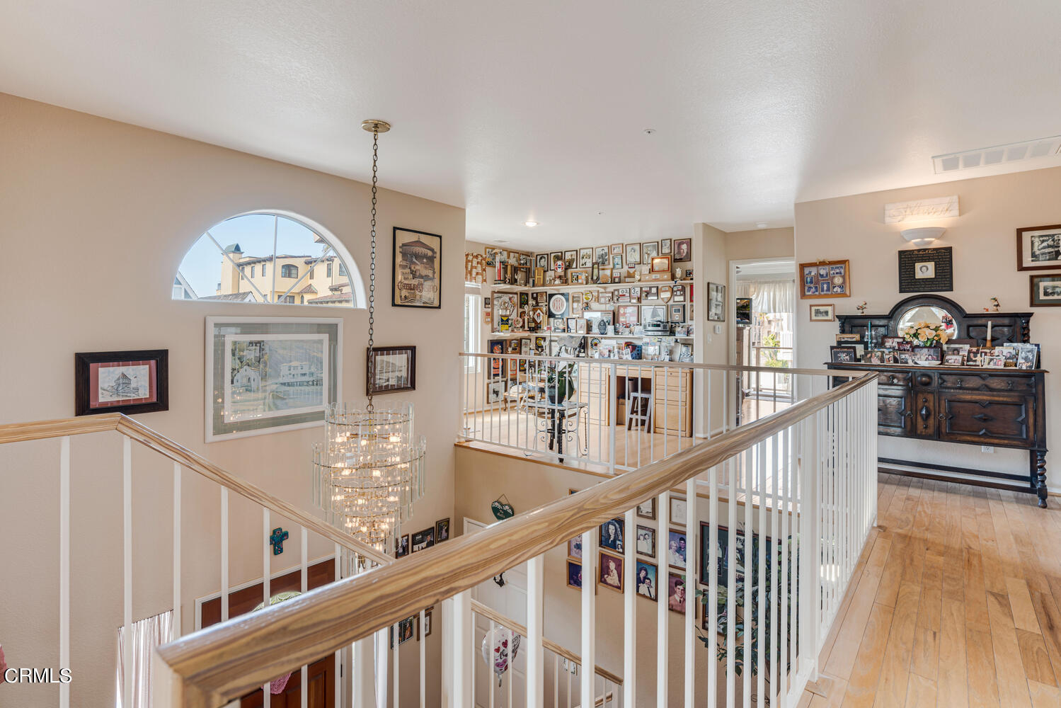 840 Mandalay Beach Road Oxnard, CA 93035 - Photo 18 of 39 a view of a hallway with wooden floor and staircase