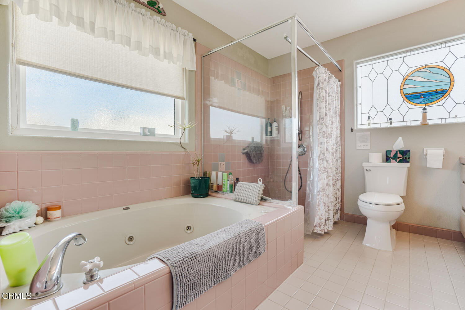 840 Mandalay Beach Road Oxnard, CA 93035 - Photo 24 of 39 a bathroom with a bathtub and a toilet