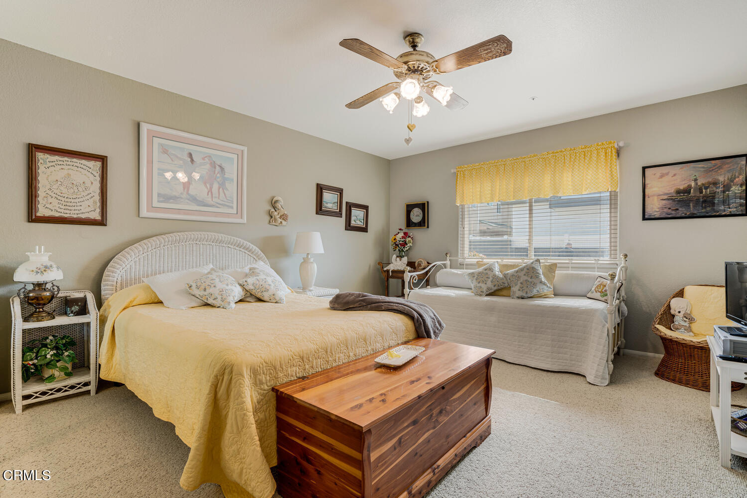 840 Mandalay Beach Road Oxnard, CA 93035 - Photo 29 of 39 a spacious bedroom with a bed a couch and a window