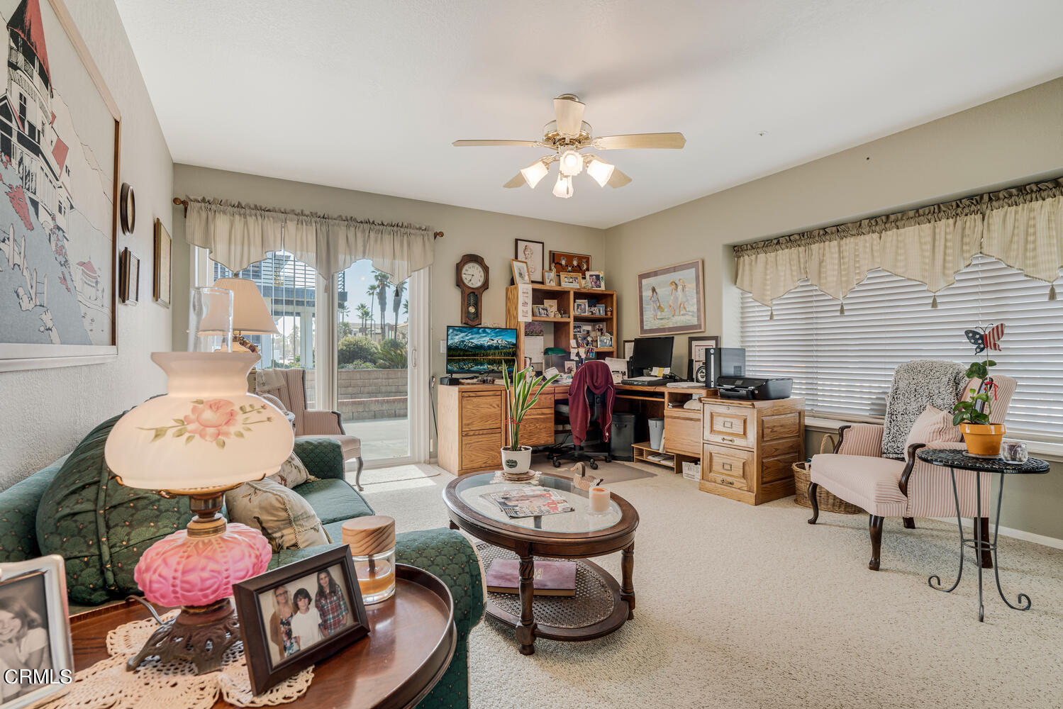 840 Mandalay Beach Road Oxnard, CA 93035 - Photo 31 of 39 a living room with furniture a rug and a chandelier