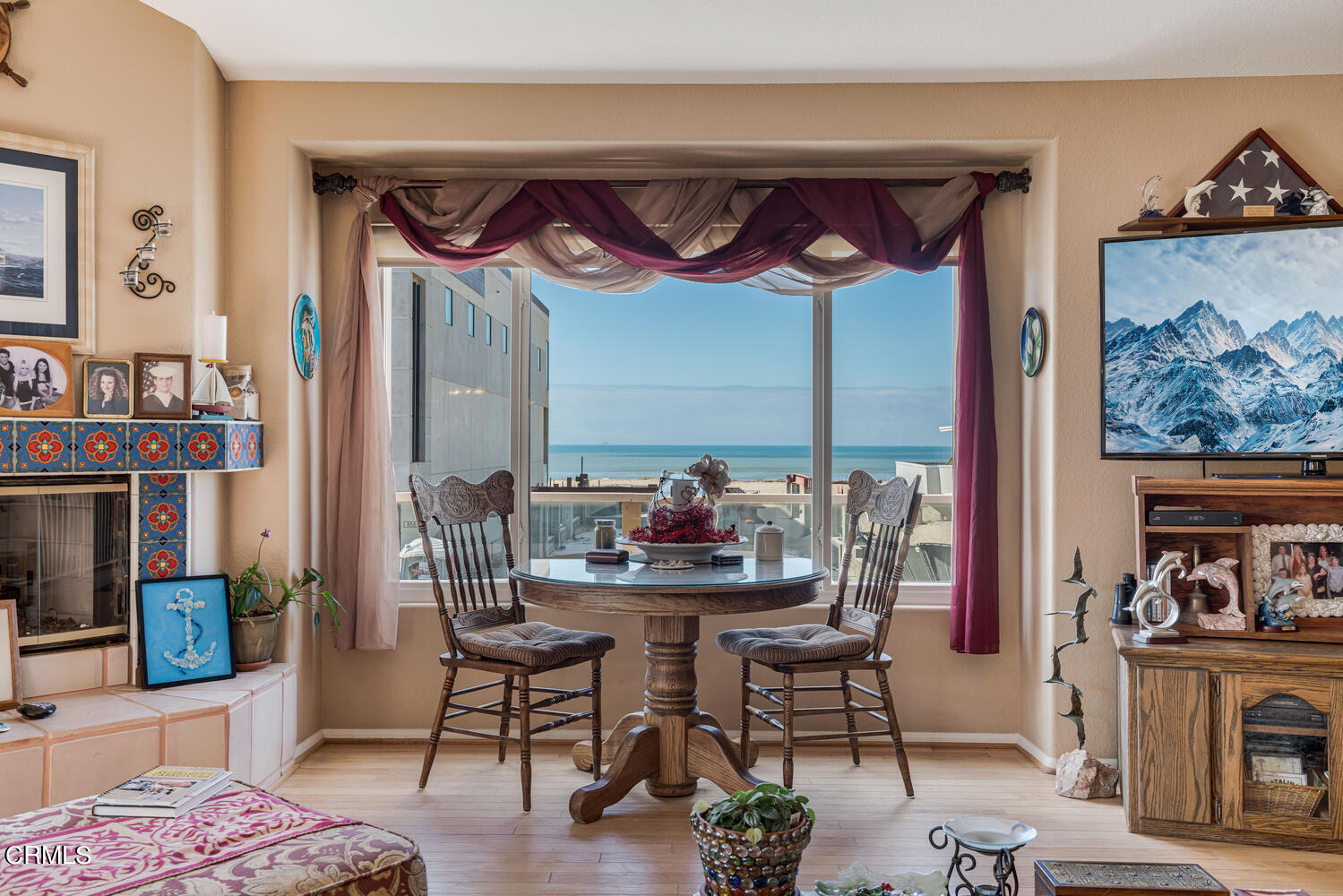 840 Mandalay Beach Road Oxnard, CA 93035 - Photo 6 of 39 a view of a dining room with furniture and chandelier