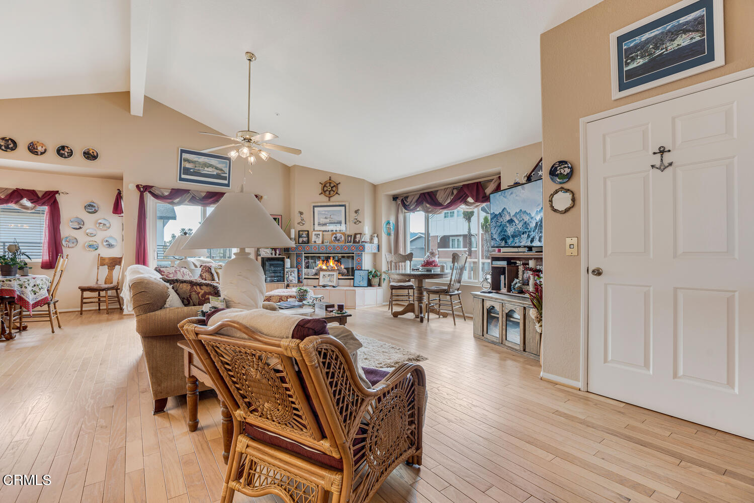 840 Mandalay Beach Road Oxnard, CA 93035 - Photo 10 of 39 a living room with furniture and a wooden floor