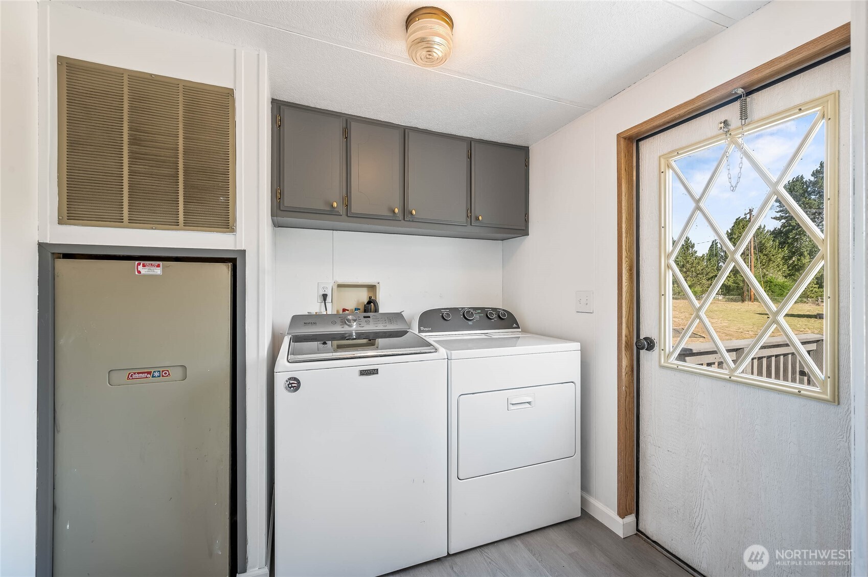 138 Trestle View Lane Cashmere, WA 98815 - Photo 16 of 30 a view of storage and utility room with washer and dryer