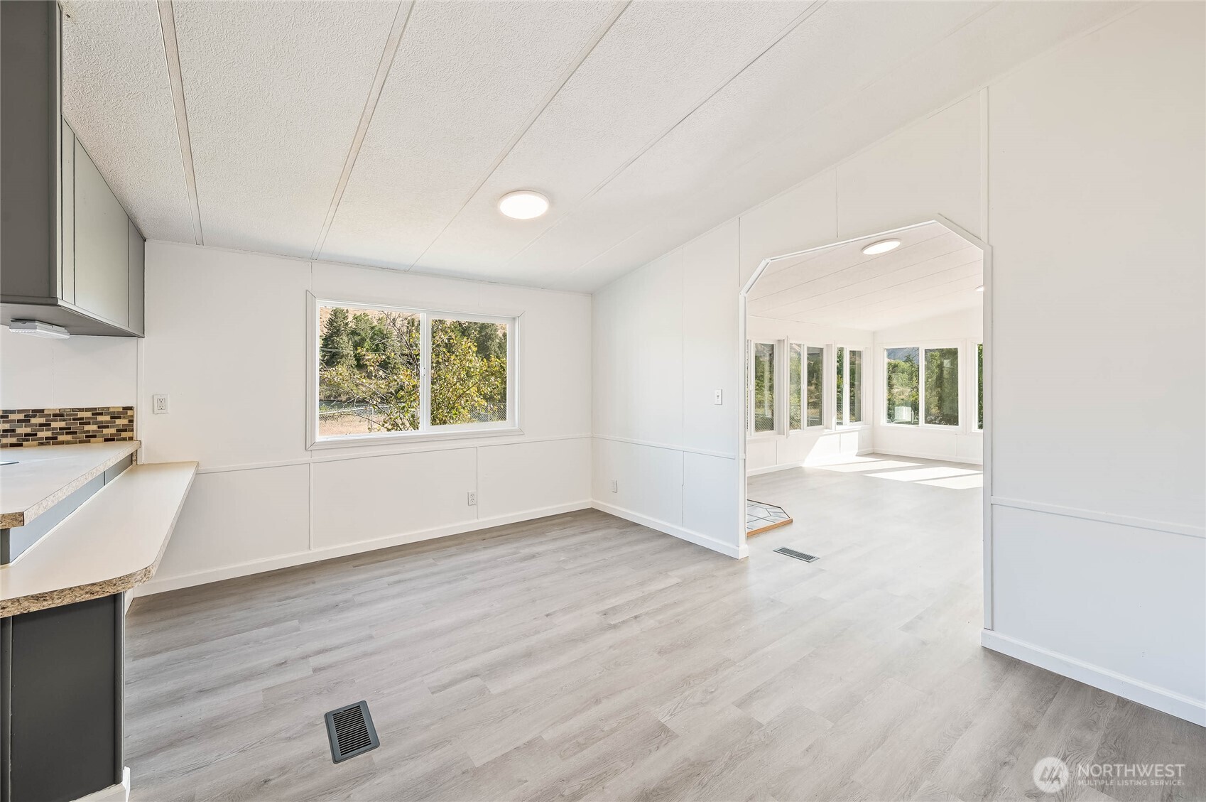 138 Trestle View Lane Cashmere, WA 98815 - Photo 18 of 30 wooden floor in an empty room with a window