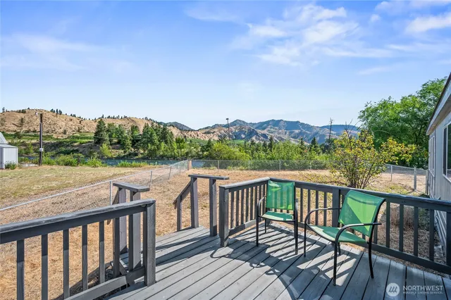 a view of balcony with furniture