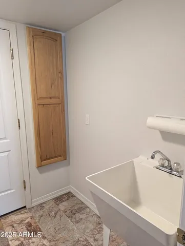 a bathroom with a bathtub and toilet
