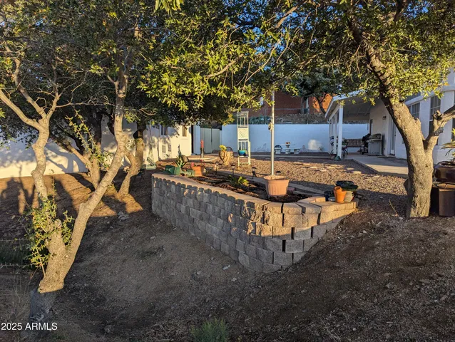 a view of a street with a building in the background