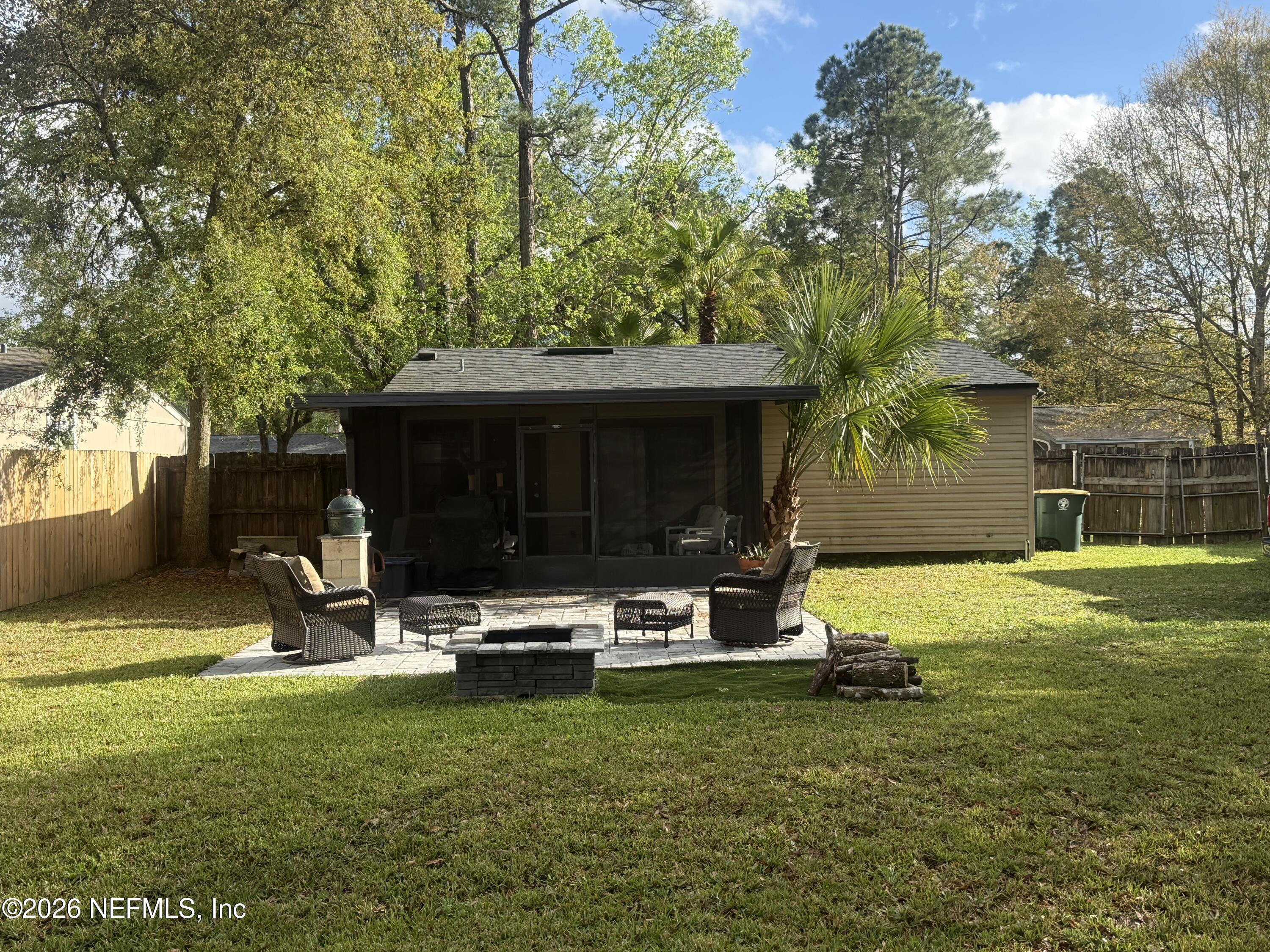 3173 Ricky Drive Jacksonville, FL 32223 - Photo 10 of 12 a view of a house with a yard