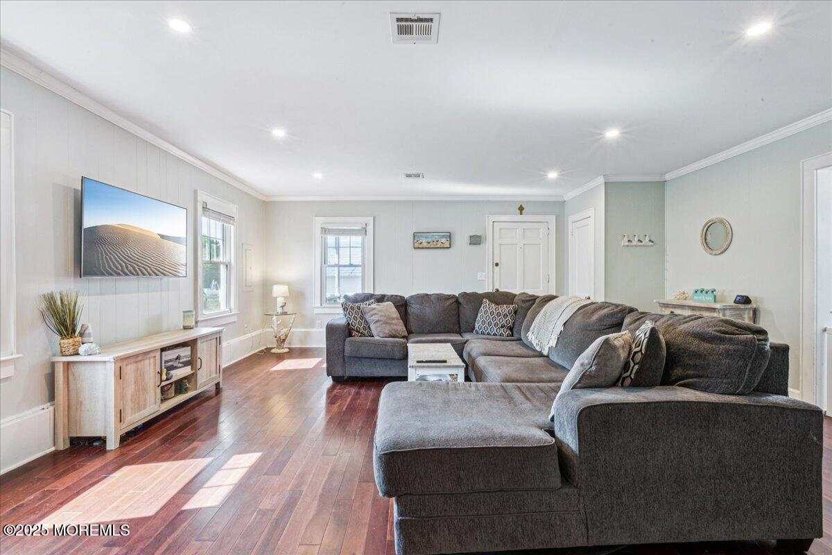 77 Drift Road Belford, NJ 07718 - Photo 5 of 23 a living room with furniture and a flat screen tv