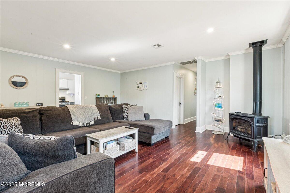 77 Drift Road Belford, NJ 07718 - Photo 6 of 23 a living room with furniture and a wooden floor