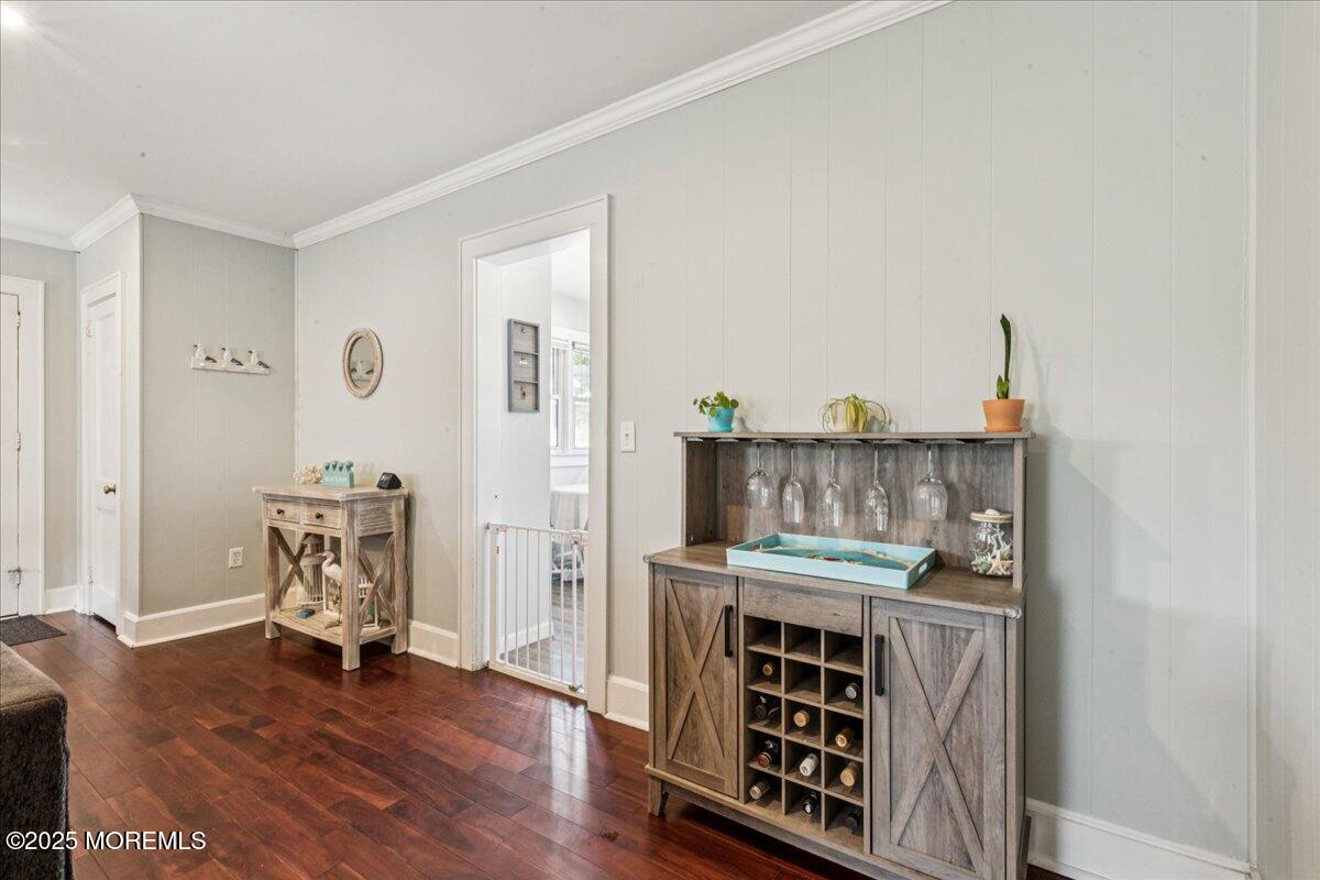 77 Drift Road Belford, NJ 07718 - Photo 8 of 23 a room with furniture and wooden floor