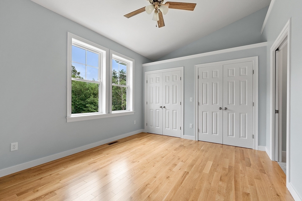 94 Fitchburg Road, Unit 2 Townsend, MA 01469 - Photo 14 of 31 a view of an empty room with a window