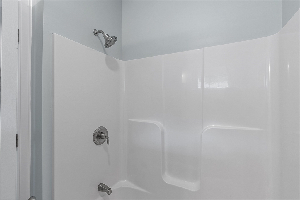 94 Fitchburg Road, Unit 2 Townsend, MA 01469 - Photo 19 of 31 a bathroom with a shower