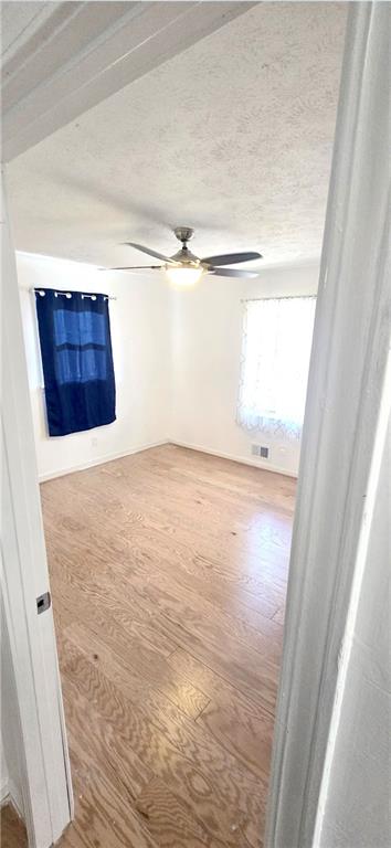 4034 Weeks Drive Kennesaw, GA 30144 - Photo 14 of 24 a view of empty room with wooden floor