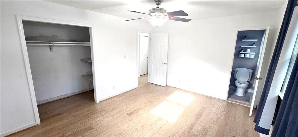 4034 Weeks Drive Kennesaw, GA 30144 - Photo 16 of 24 a view of an empty room with wooden floor