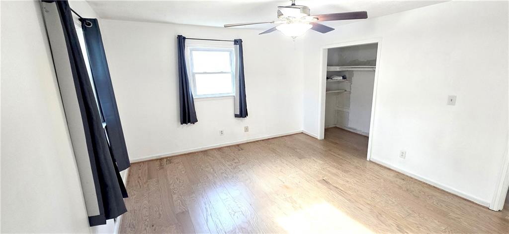 4034 Weeks Drive Kennesaw, GA 30144 - Photo 17 of 24 a view of a room with wooden floor and white walls